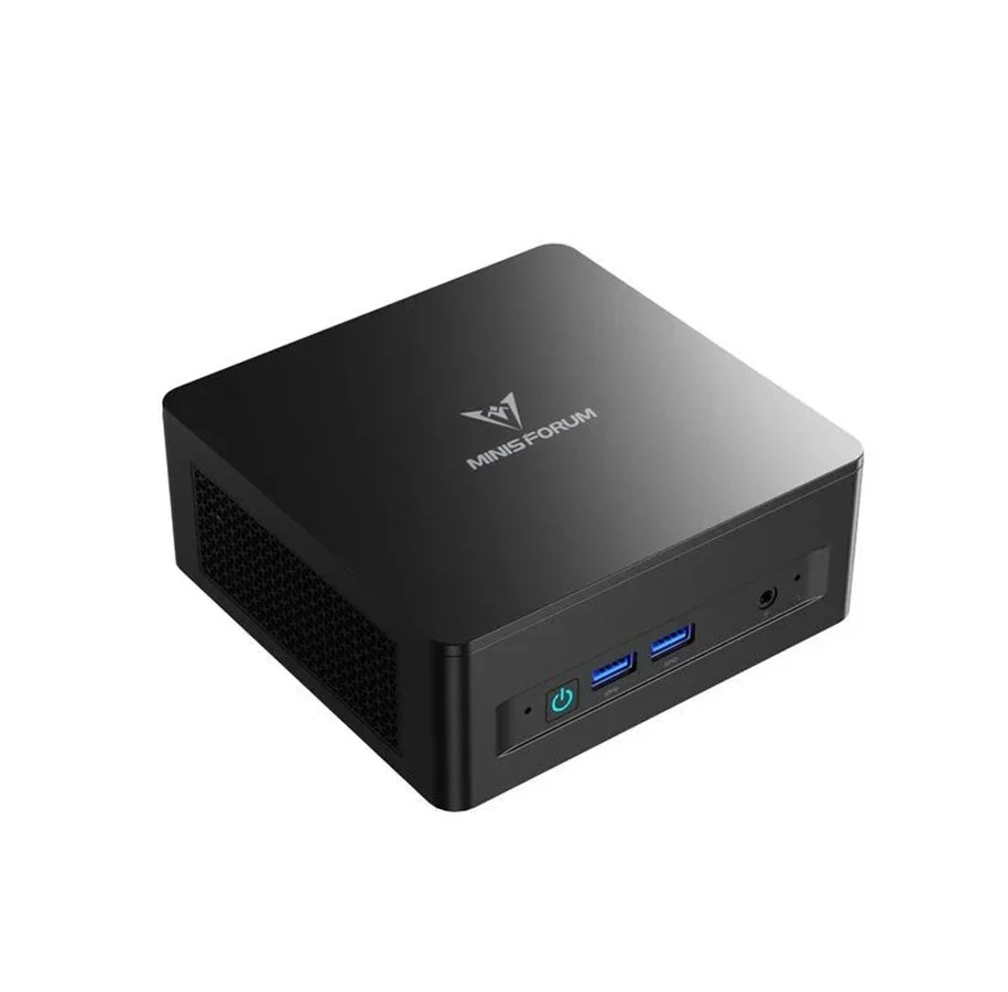 Liten svart mini-PC bakom en skärmfot